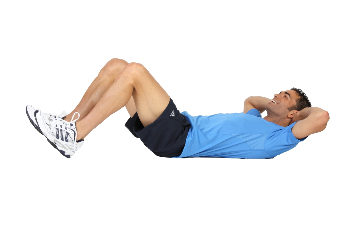 Bauchmuskeln im liegen für einen sixpack