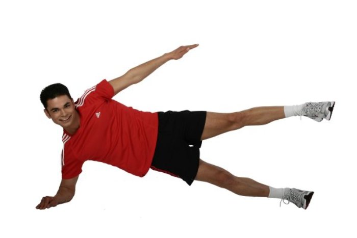 Fitnessübung für die seitliche Bein und Bauch Muskulatur zur Mobilisation- und Stabilisation